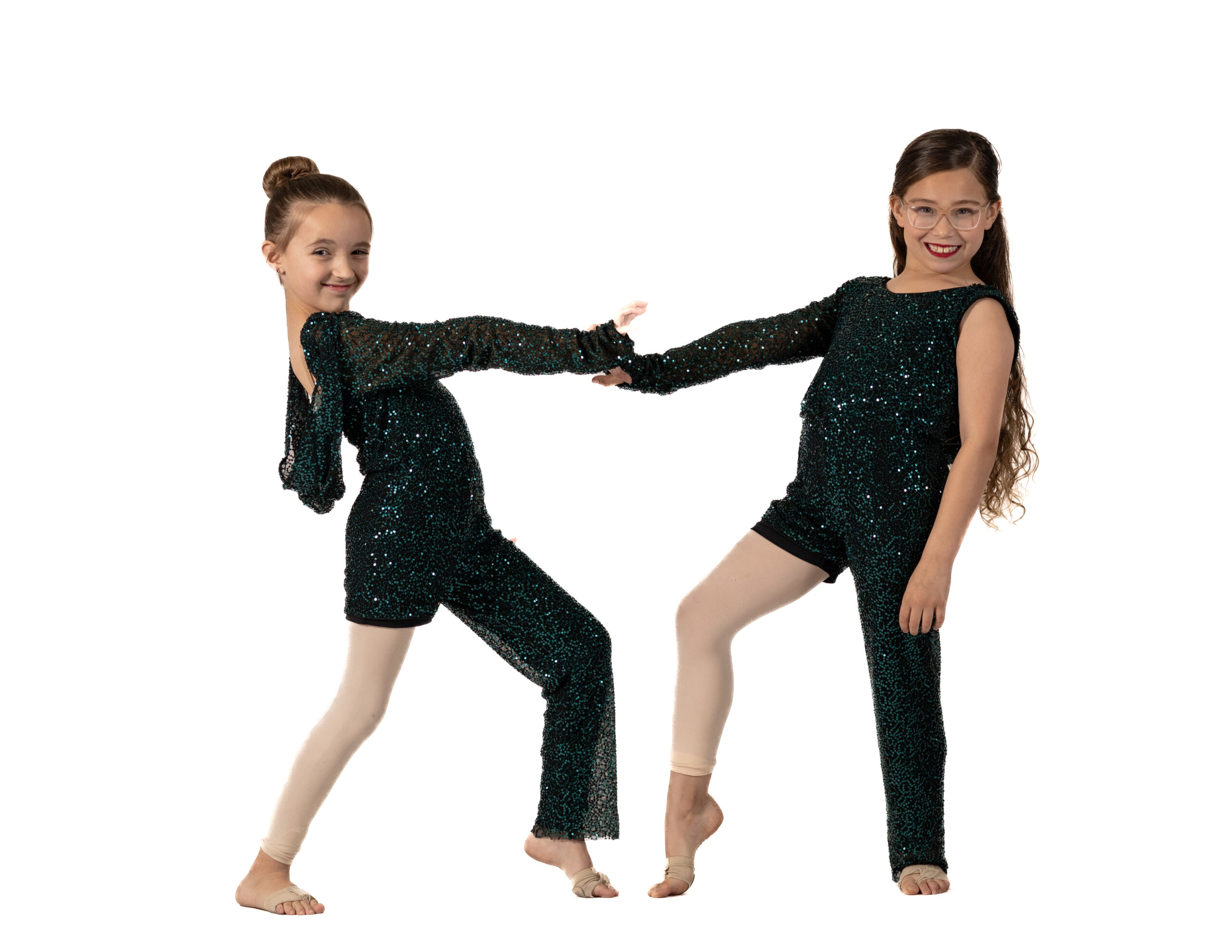 Two Symmetry Dance Company Dancers in green costumes for the Pre-Teen program
