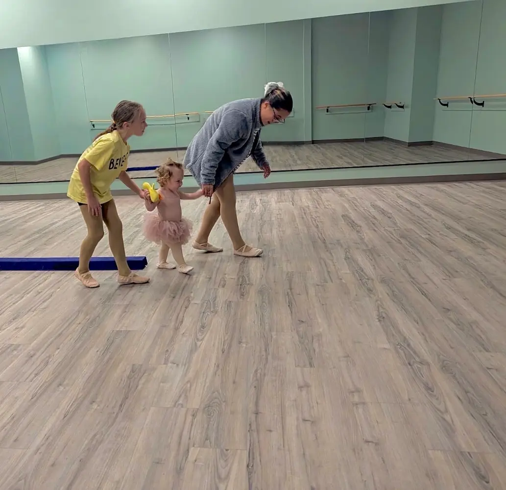 Young dancers practicing at ballet bar in toddler ballet class in Scranton, PA