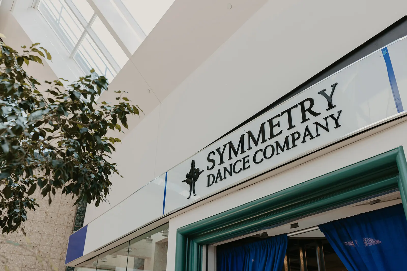 Exterior of Symmetry Dance Company studio sign at the Marketplace at Steamtown in Scranton, PA